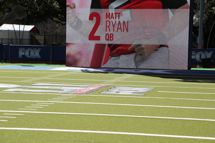 Specialty turf flooring custom logos